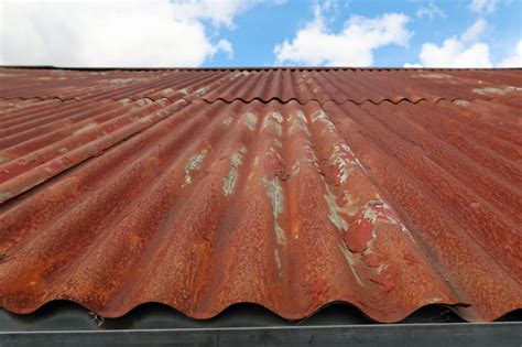 houses with rusty looking metal roofs|rusty metal roof refinishing.